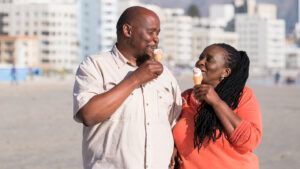 Happy couple eating ice cream