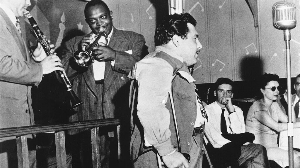 Doc Pomus performs in a nightclub; credit: Michael Ochs Archives/Getty Images