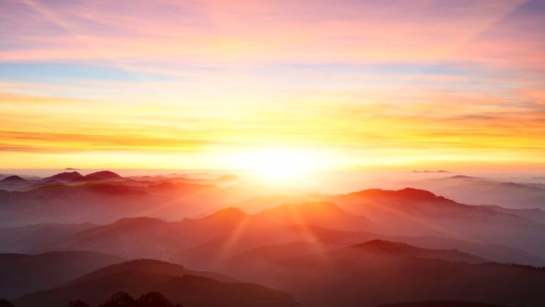 A colorful, illuminating sunrise; Getty Images
