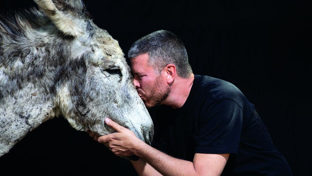 Ron King, executive director at Oscar's Place Adoption Center and Sanctuary, and a rescue donkey