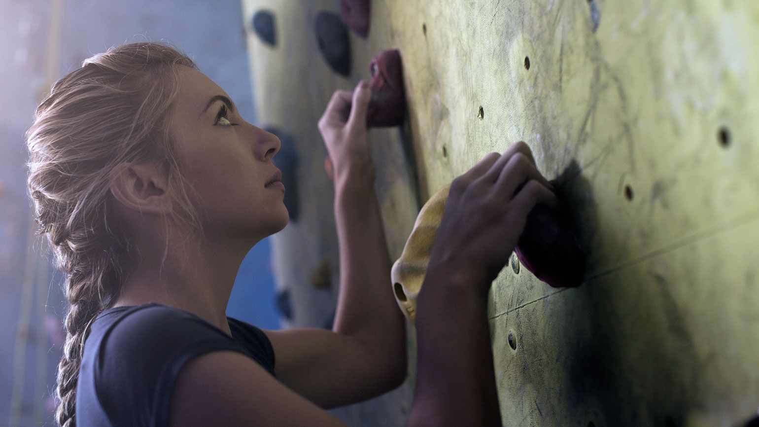 Woman on climbing wall