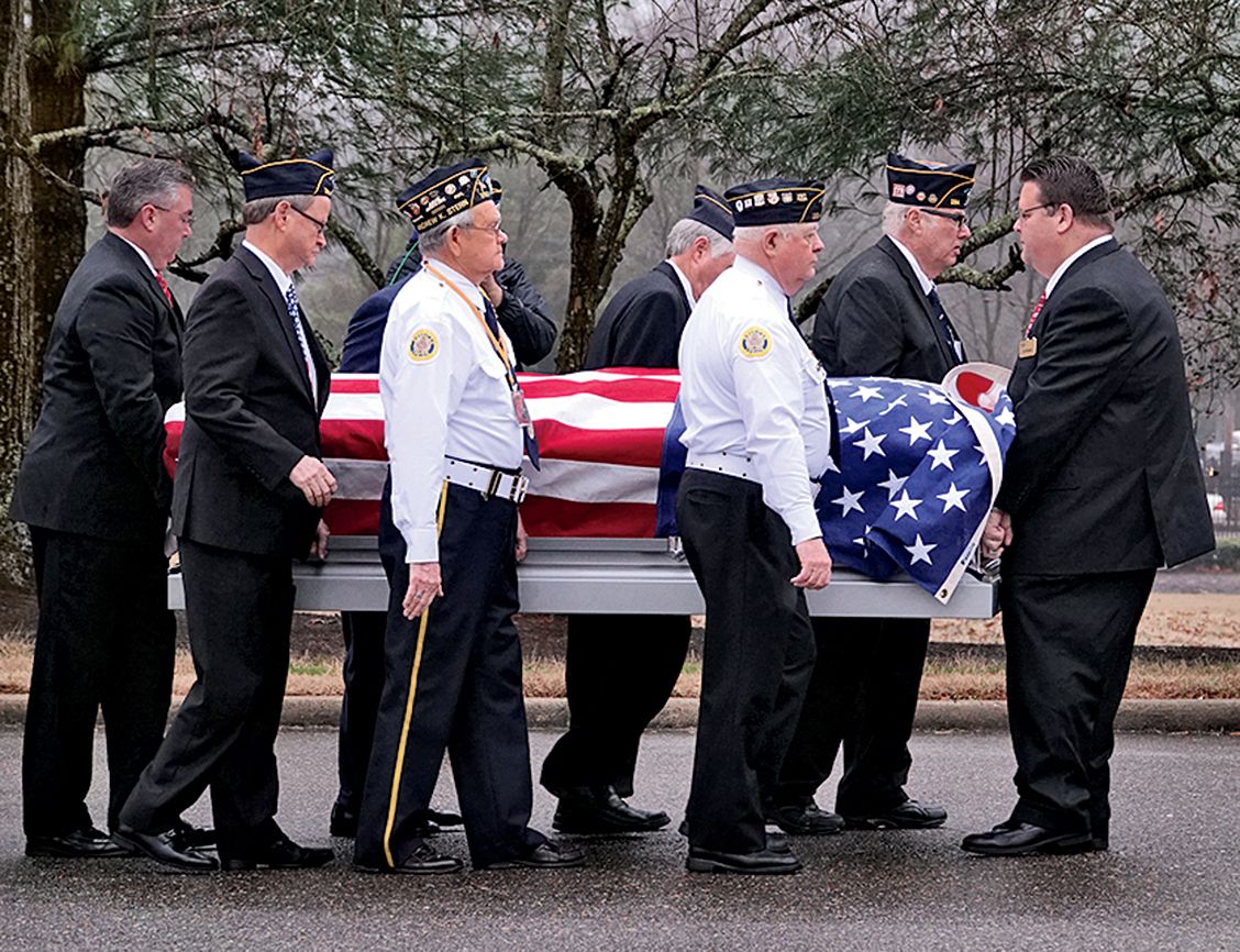 Pallbearer escort a departed veteran to his final resting place; photo by Karen Pulfer Focht: