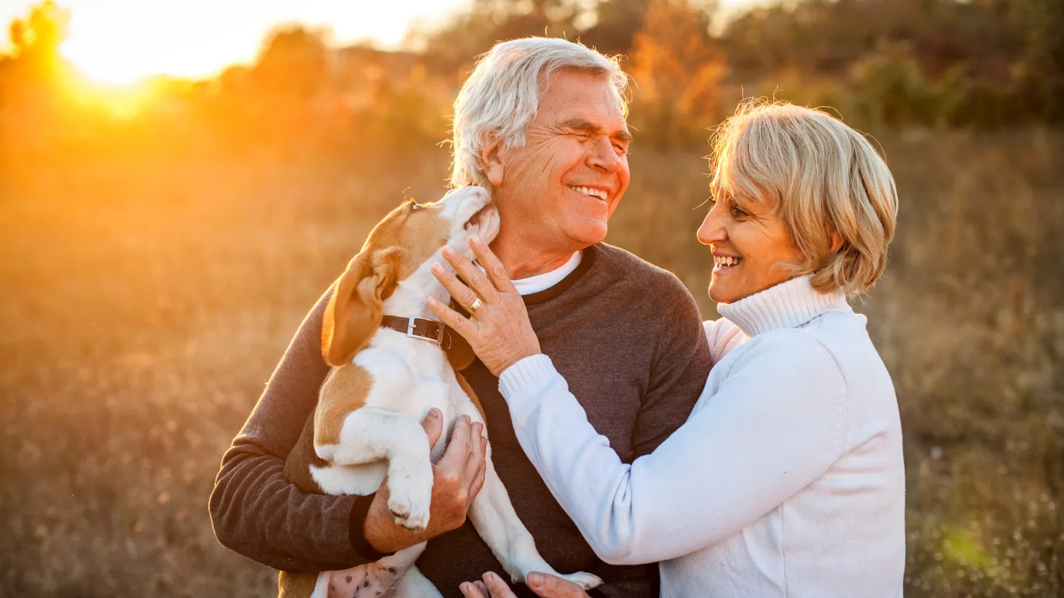 Couple with their puppy (Getty Images)