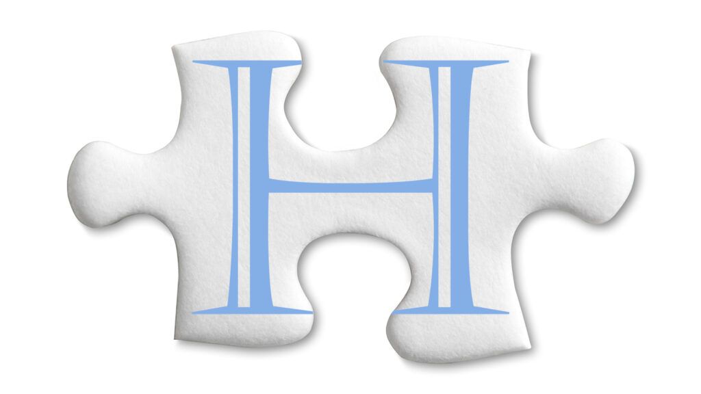 A puzzle piece with the letter H