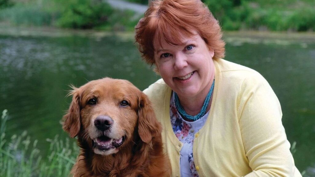 Peggy Frezon and her dog (photo by Roy Gumpe)