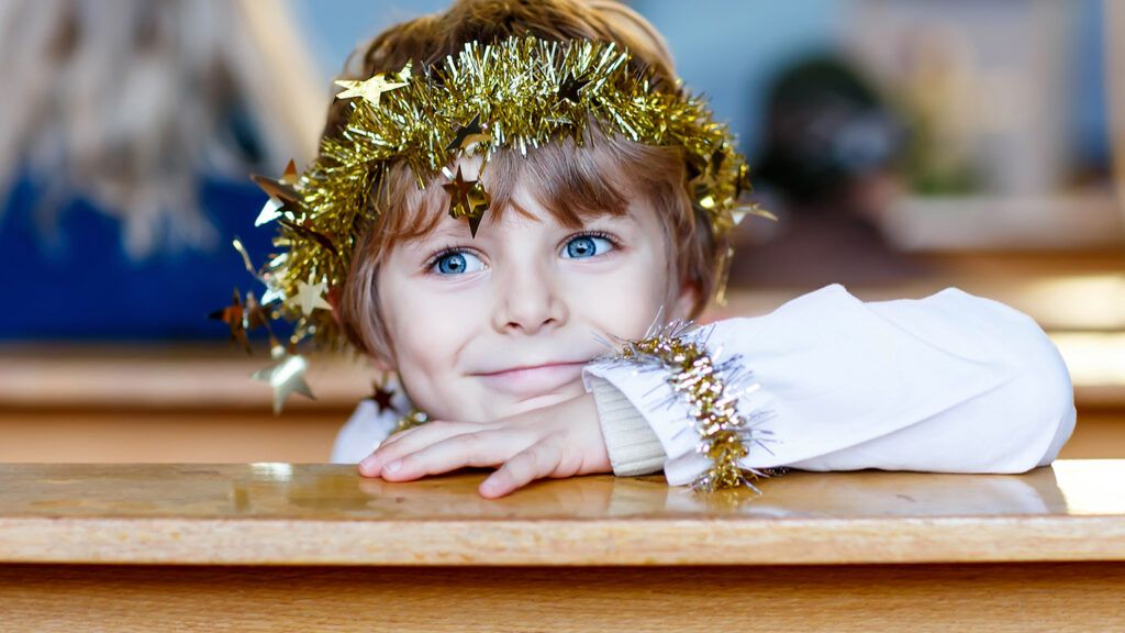 A child dressed as an angel for a Christmas pageant; Getty Images