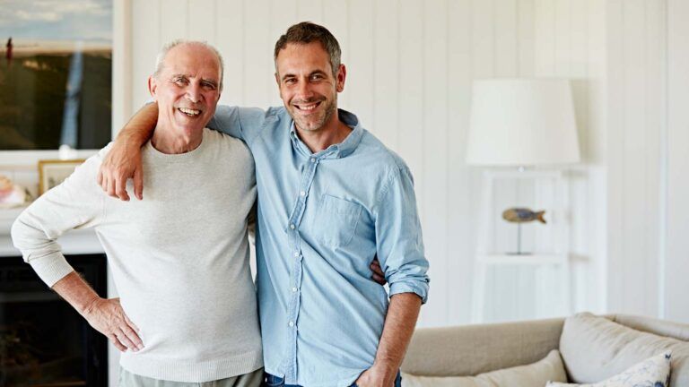 Father and son in their home; Getty Images