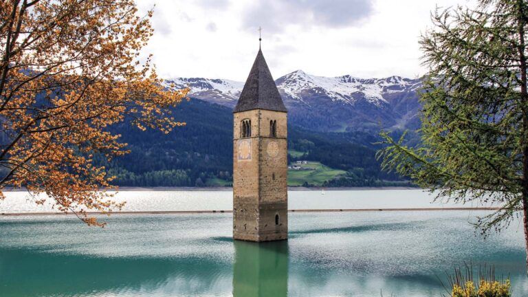 Bell tower of a 14th century church in South Tyrol, Italy; Photo credit: GETTY IMAGES/ISTOCKPHOTO