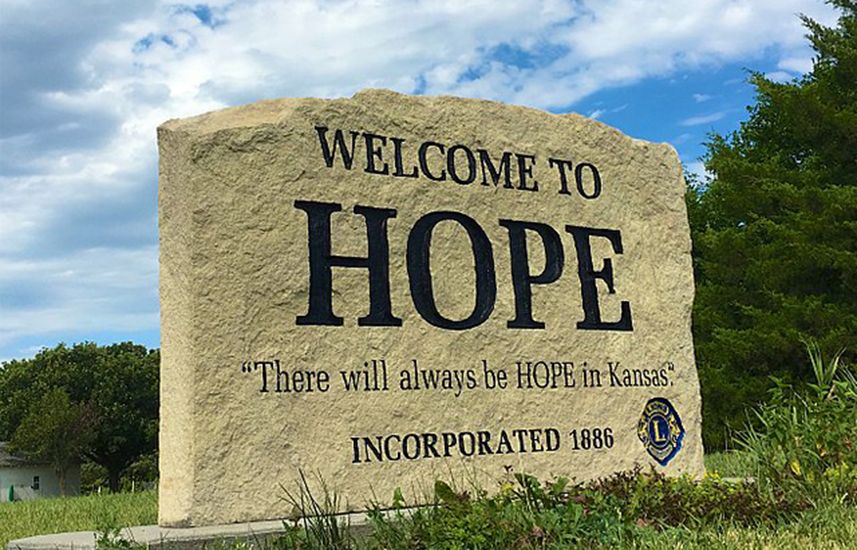 Welcome banner in limestone, at Hope, Kansas