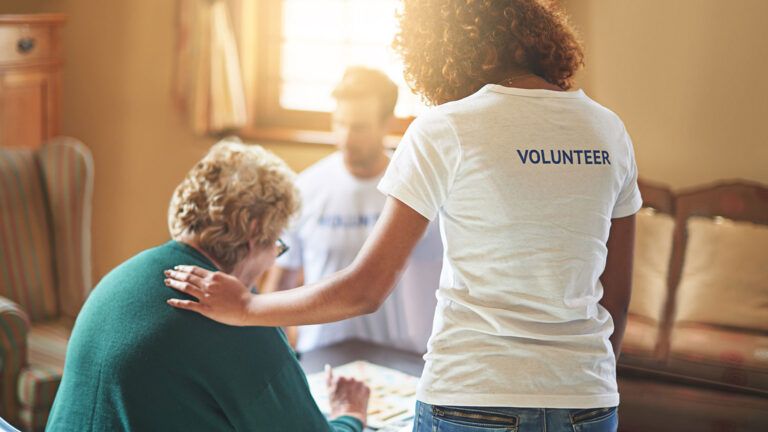 A volunteer at a senior center