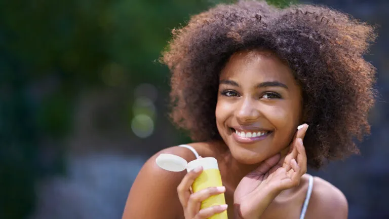 Applying sunscreen for skin protection