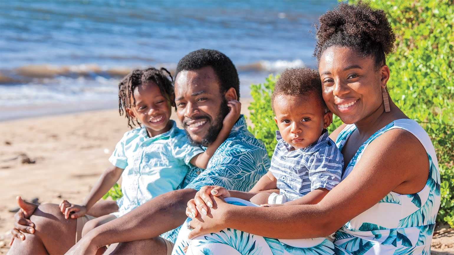 Tiera Fletcher and her family on the beach sharing her god encounter and story of faith