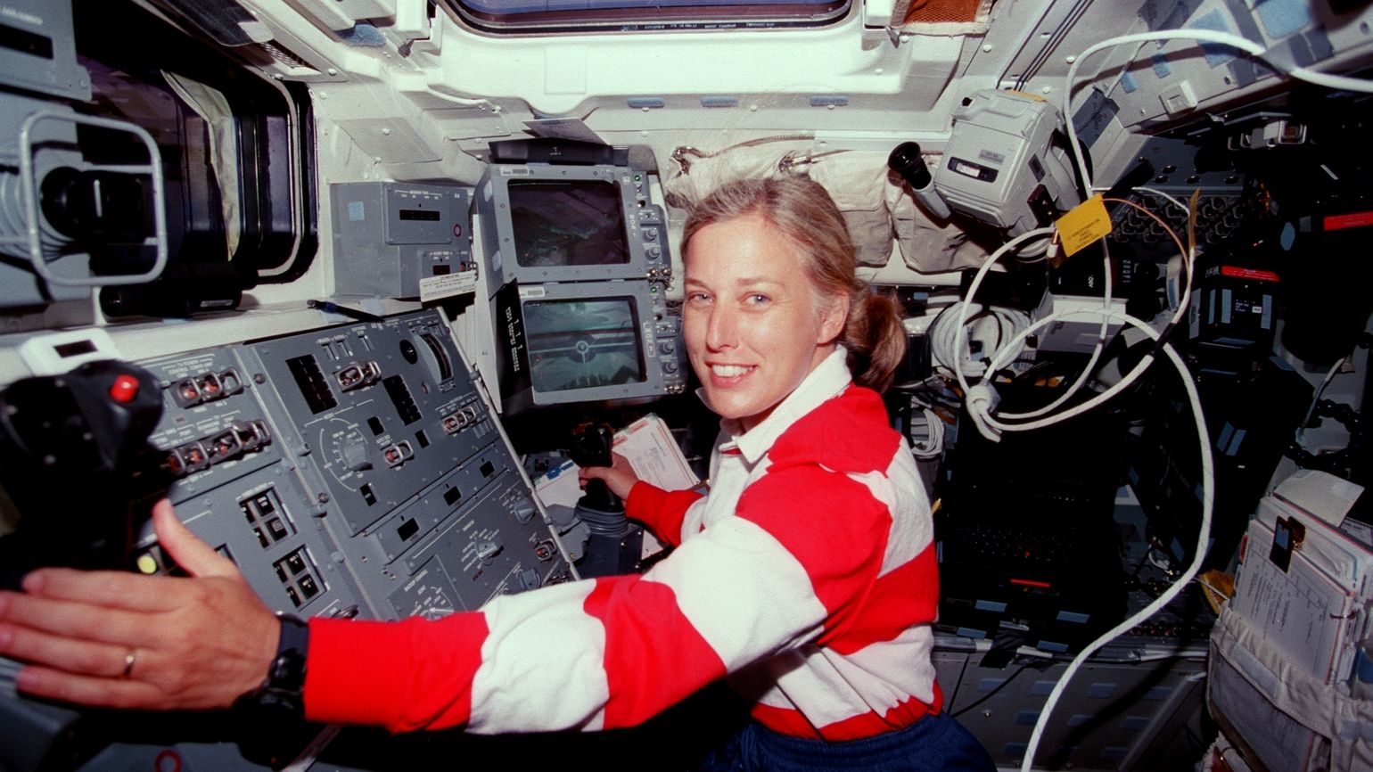 Jan Davis at the work station with inspirational quotes from NASA Astronauts