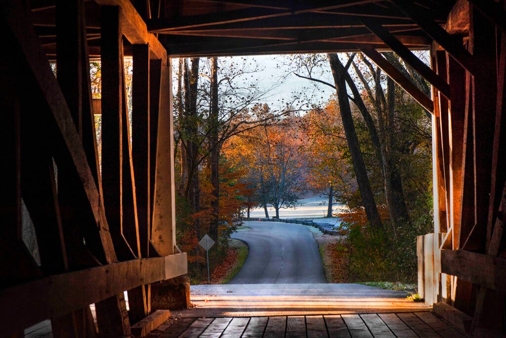 The old covered-bridge entrance to Nashville’s Brown County State Park; photo by Scott Goldsmith