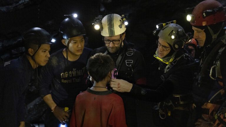 The cast of Thirteen Lives on set in true inspiring story of Thai cave rescue