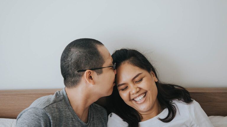 Husband kisses his wife to show his gratitude vs thankfulness