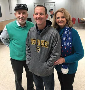 Ryan Hodges with his parents; Photo Courtesy Rita Hodges