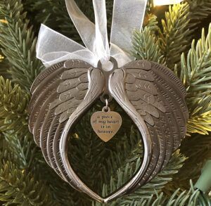 Christmas Angel Wings Ornament memorial gift hanging in a tree