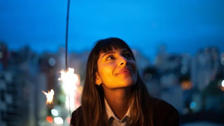 Young woman looking up at the sky