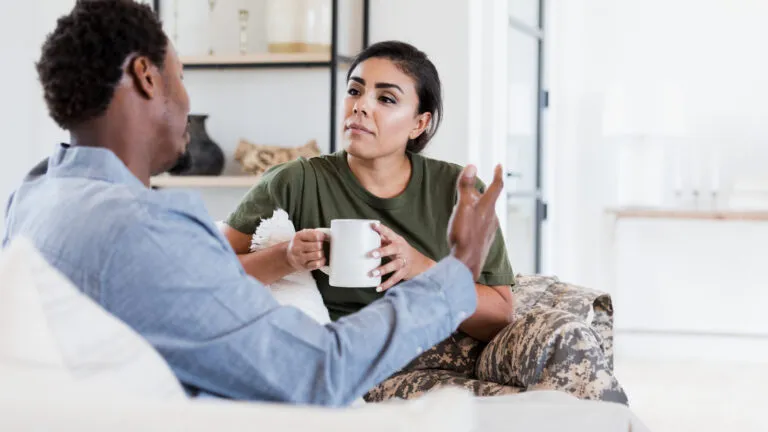 A woman soldier and her husband have a serious conversation about their marriage habits