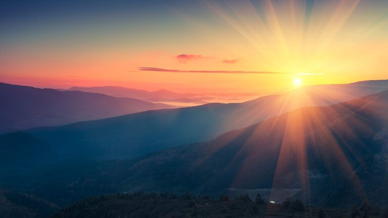 Colorful sunrise in the mountains; Getty Images