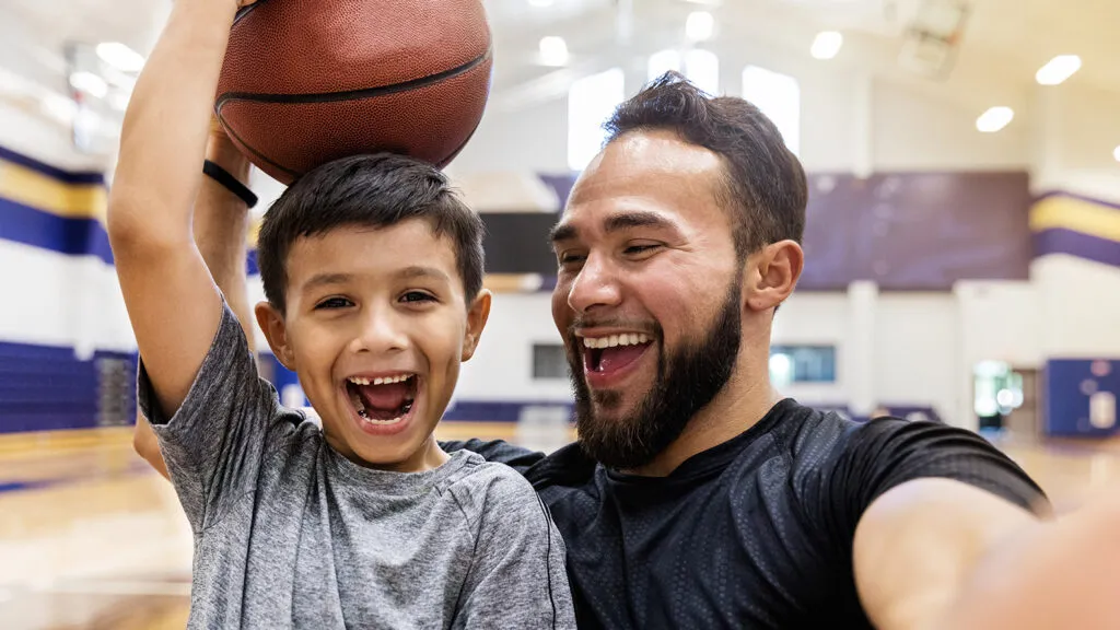 Young dad building a positive relationship with his son.