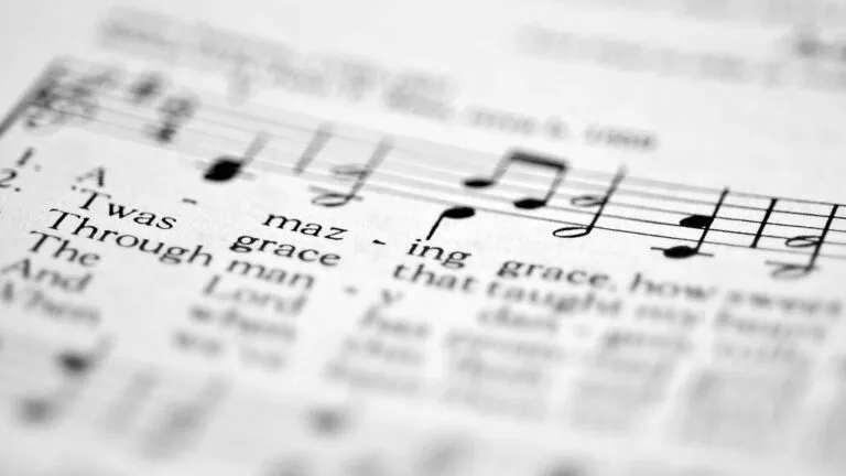 Close up on sheet music for the lent hymn amazing grace