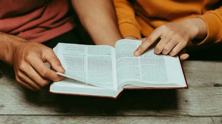 Couple reading about lent in the Bible together