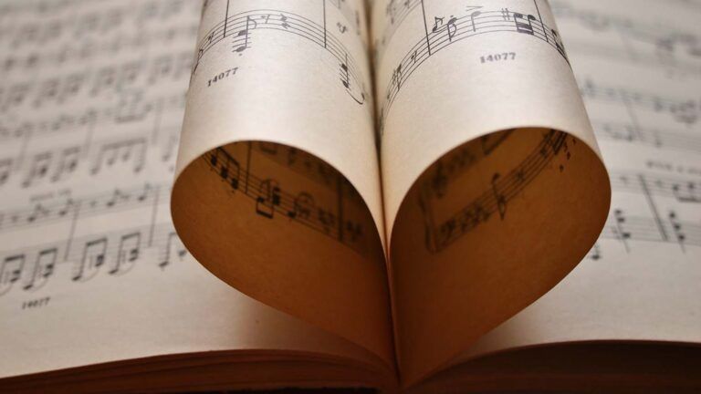 Lent hymn sheet music wrapped into a heart shape