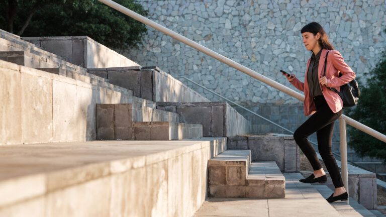 Woman going up steps for her new habit