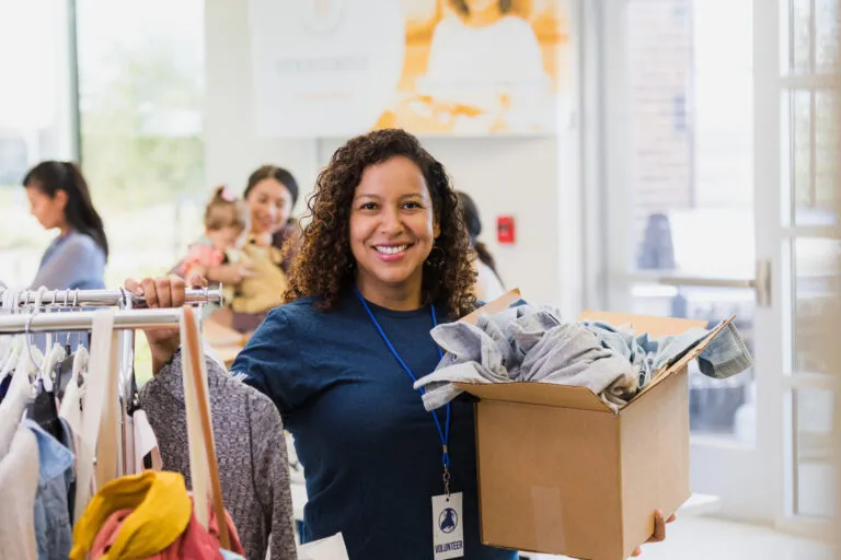 Woman shopping in a thrift store.