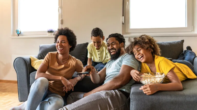 Family watching a movie