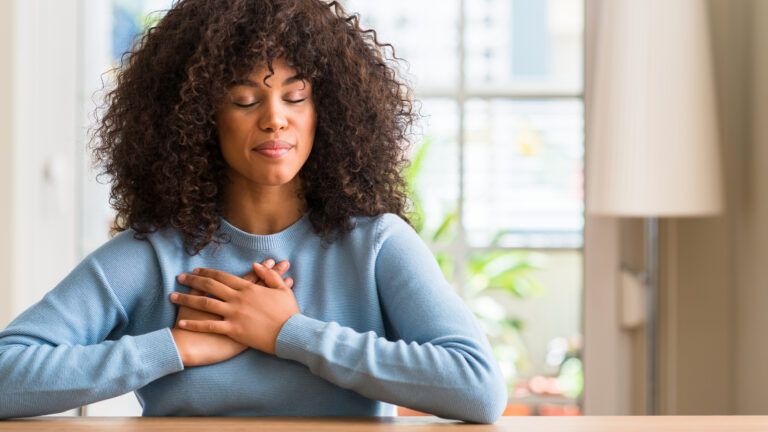 Woman praying one-word prayers for Lent