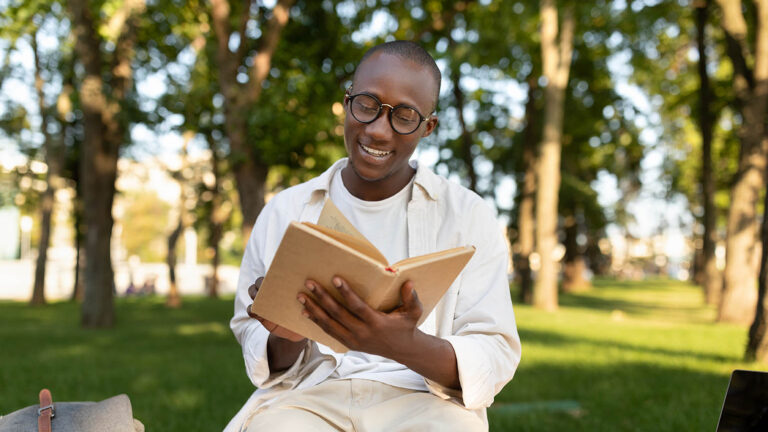 Man reading outside as a spring activity